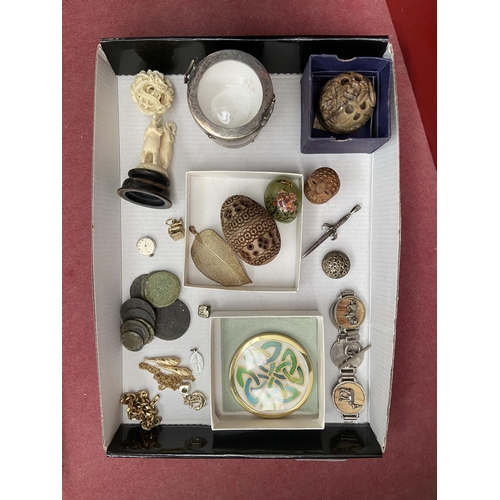 493 - Tray containing curios including a puzzle ball and African bracelet