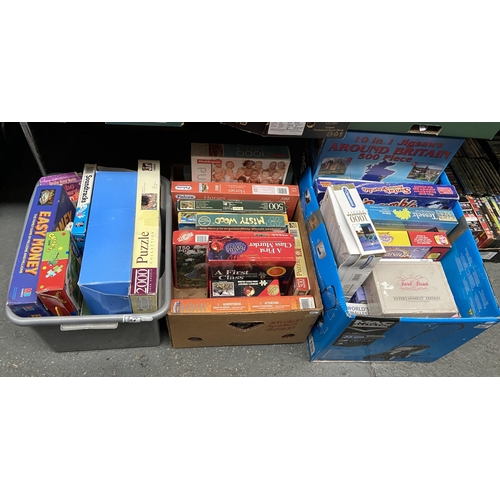 84 - 3 Boxes containing jigsaw puzzles and board games