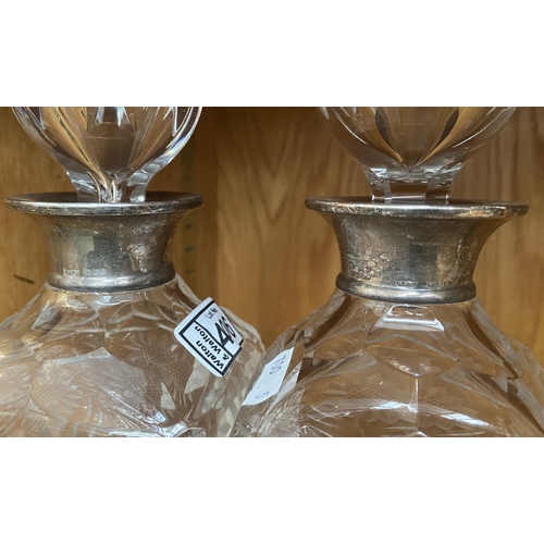 406 - Pair of silver collar cut glass decanters