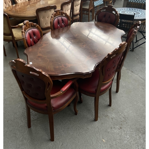 438 - Ornate Italian style dining table and 6 chairs