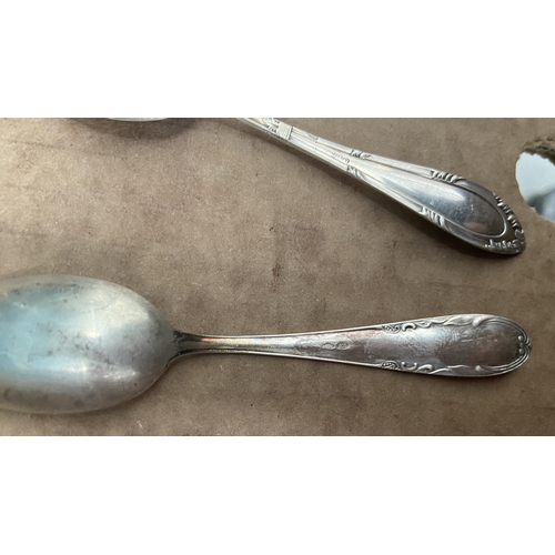 468 - Box containing a quantity of '800' silver spoons