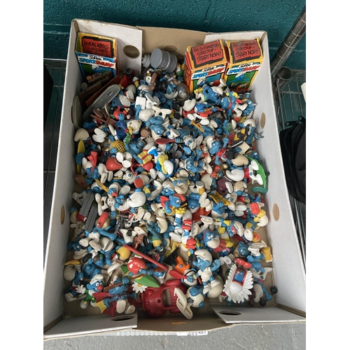 479 - Box containing Smurfs