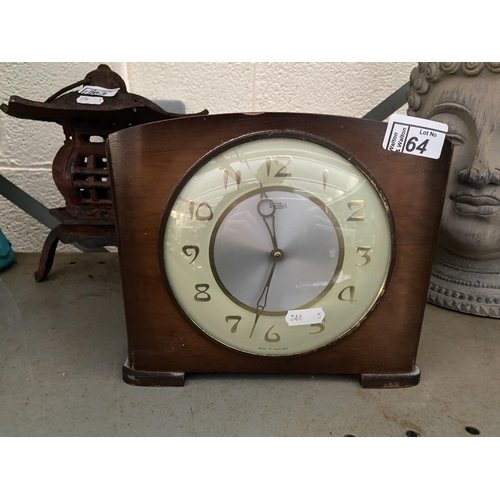 64 - 'Time Savings' mantle clock