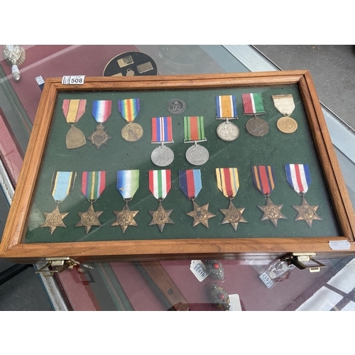 508 - Case containing WW1 medals including Italy Star, Burma Star and Victory medal