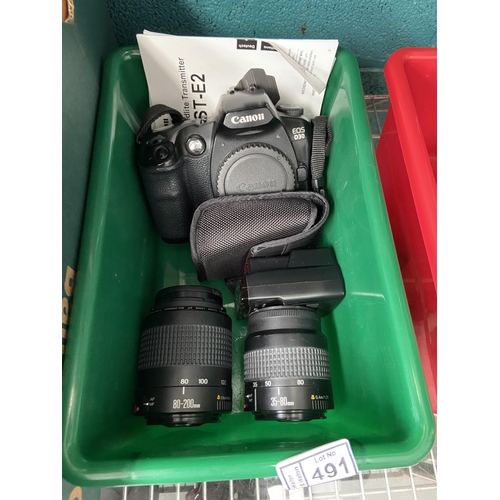 491 - Canon camera and 2 lenses