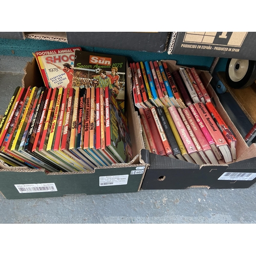 503 - 2 Boxes containing football annuals etc