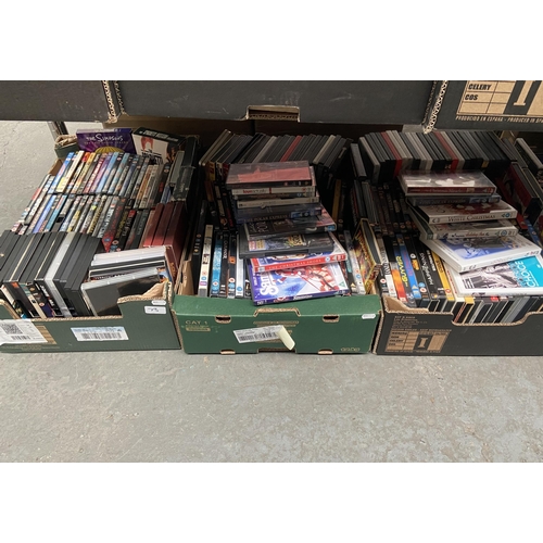 73 - 3 Boxes containing DVDs