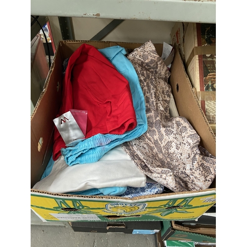 169 - Box containing new clothing
