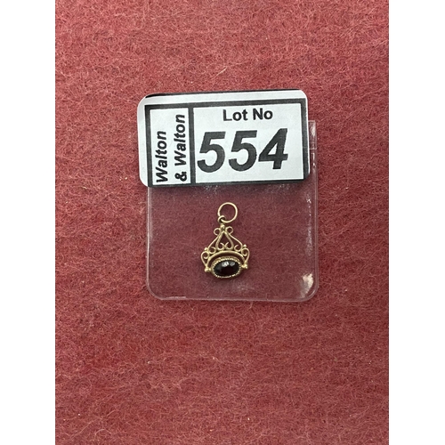 554 - 9ct gold swivel pendant