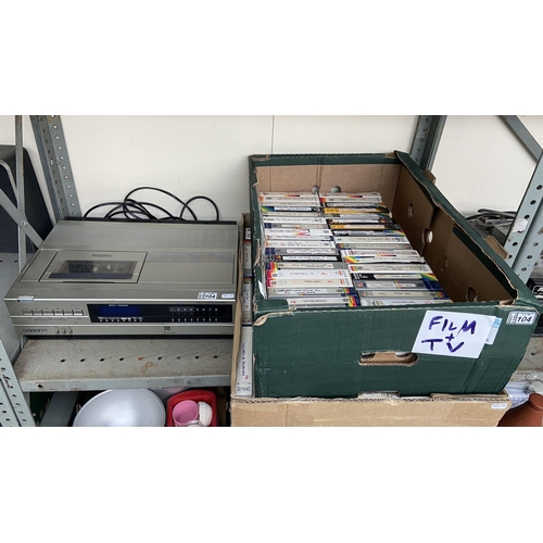 104 - Betamax player and 2 boxes containing films etc