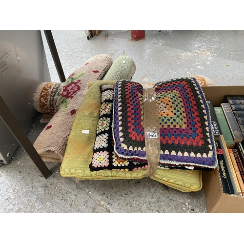 164 - Quantity of cushions and rugs