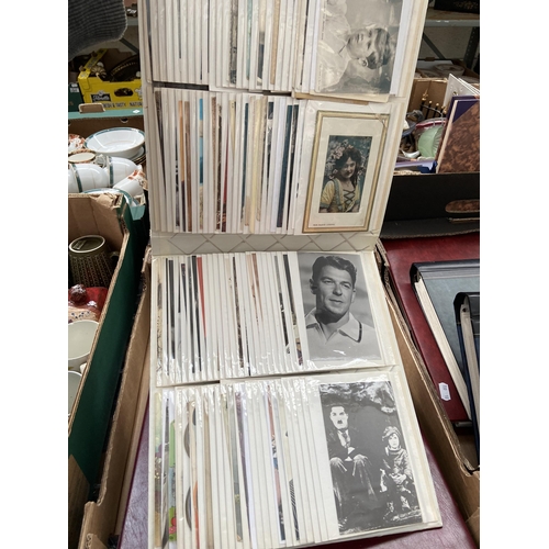 125 - 4 Albums containing postcards and celebrity photographs etc