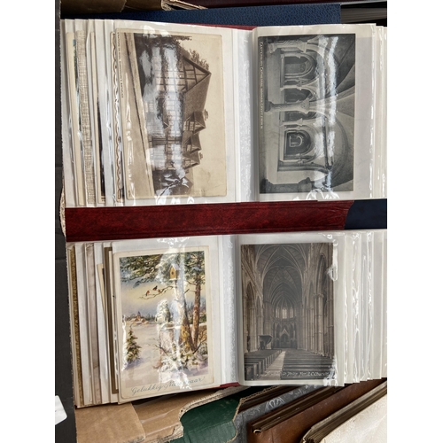 126 - 4 Albums containing postcards and vintage photographs etc