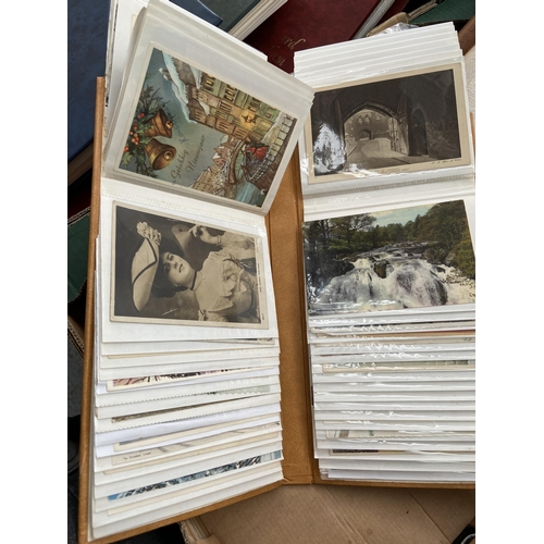 127 - 4 Albums containing postcards and vintage photographs etc