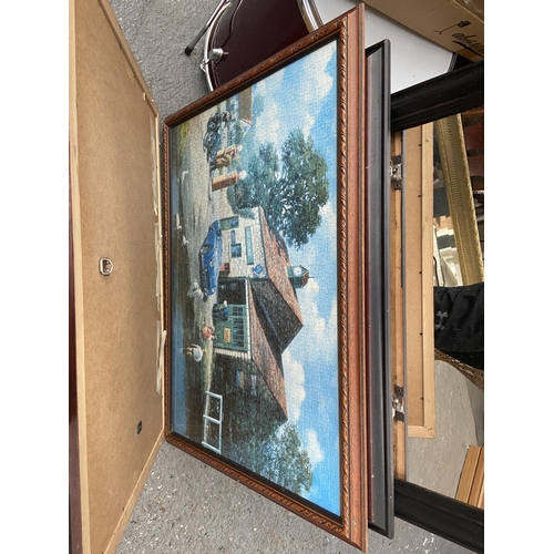 202 - Quantity of framed jigsaws, prints and a mirror