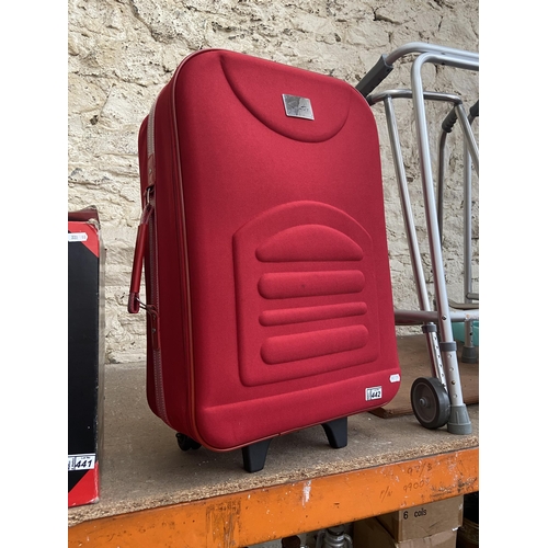 442 - Large red suitcase