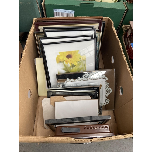 519 - Box containing photo frames