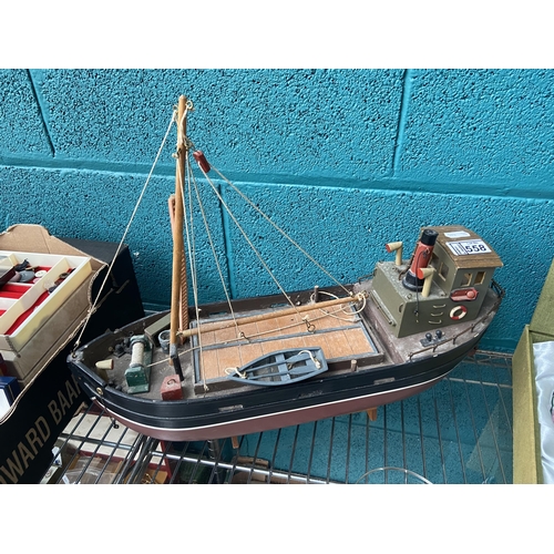 558 - Model trawler on stand