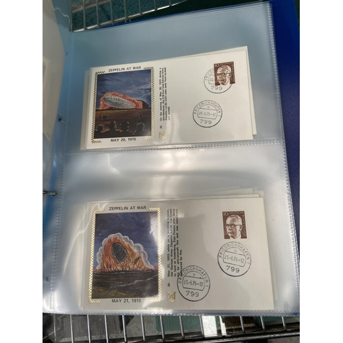 568 - 3 Stock books of world stamps and first day covers