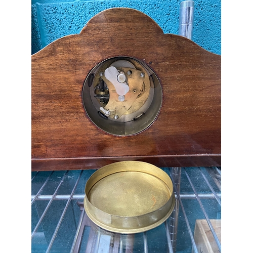 601 - Ornate veneered mantle clock