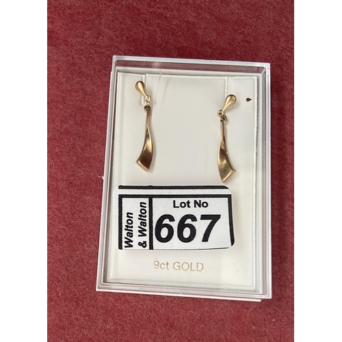 667 - Pair of 9ct gold drop earrings