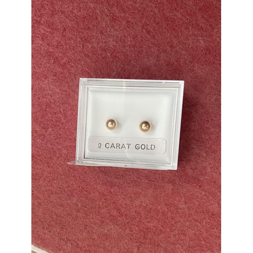 674 - Pair of 9ct gold earrings