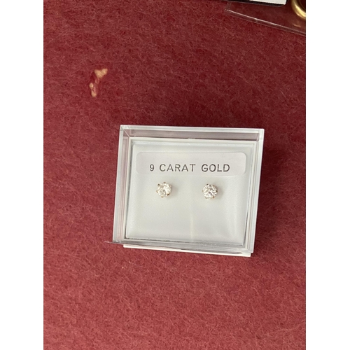 677 - Pair of 9ct gold earrings