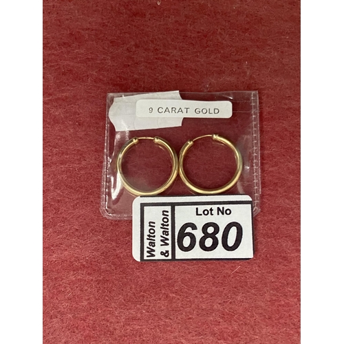 680 - Pair of 9ct gold earrings