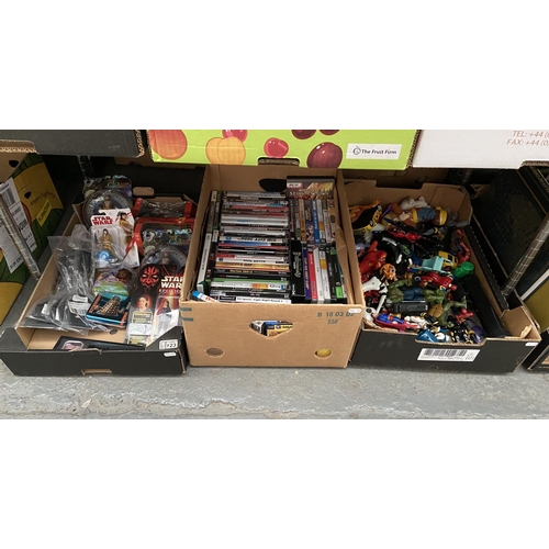 123 - 3 Boxes containing DVDs and figures etc including Star Wars