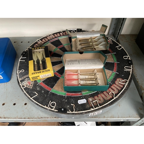 130 - Dartboard with darts