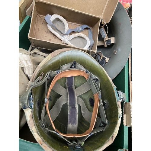 76 - Box containing military equipment including helmets and flying goggles