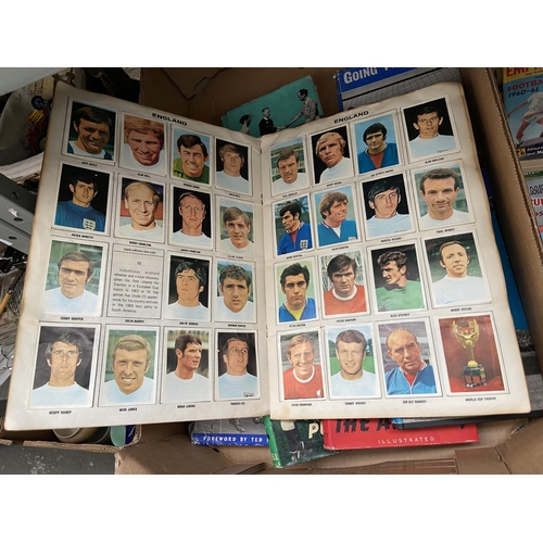 49 - 2 Boxes containing 1950's Football Annuals and a 'Mexico 70' sticker book etc