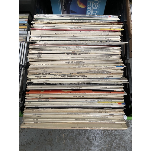 70 - 2 Boxes containing CDs and records