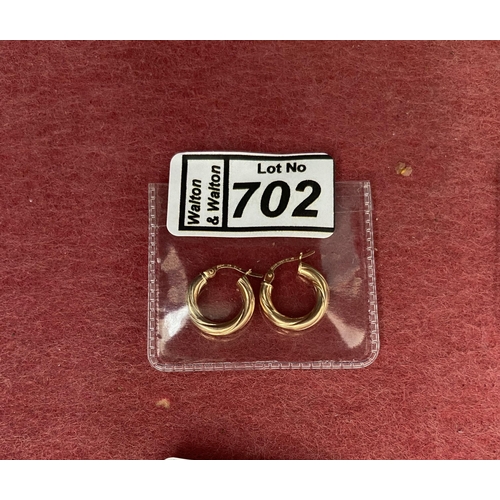 702 - Pair of 9ct gold hinged creole earrings