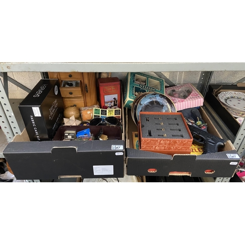 47 - 2 Boxes containing a jewellery box, wooden puzzles and curios