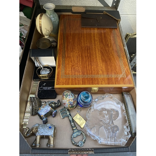 69 - Box containing curios including a large brass key, elephants and watches