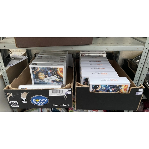 4 - 2 Boxes containing new 'Space Traveler' jigsaw puzzles