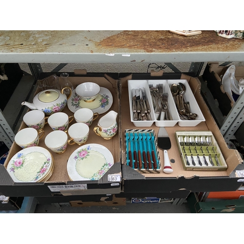 63 - 2 Boxes containing floral China and Oneida cutlery sets