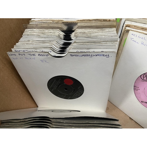 83 - Box containing singles