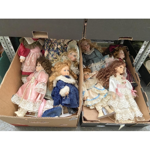 59 - 2 Boxes containing porcelain faced dolls