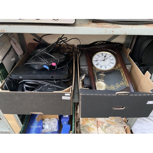 165 - 2 Boxes containing a VHS player, clock and CD player etc