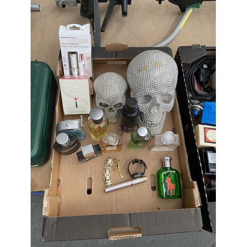 472 - Box containing 'crystal' skulls and perfume etc