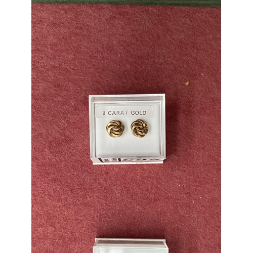 589 - Pair of 9ct gold earrings