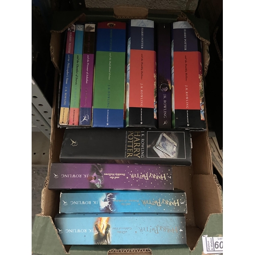 60 - Box containing Harry Potter books