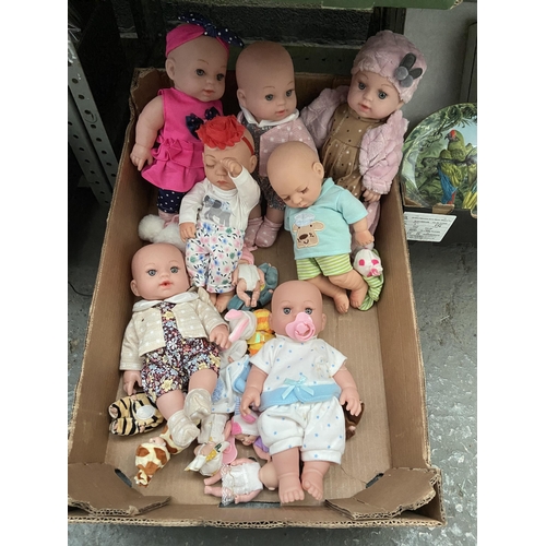 70 - Box containing baby dolls