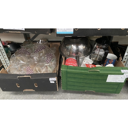 131 - 2 Boxes containing mugs, glass and a colander etc