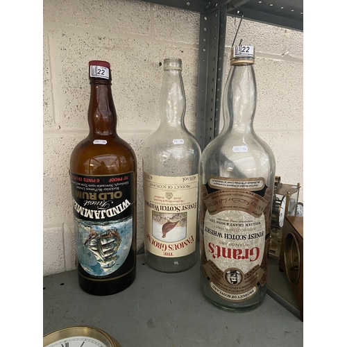 22 - 2 Large whisky bottles and a rum bottle