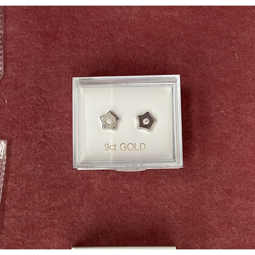 626 - Pair of 9ct white gold earrings