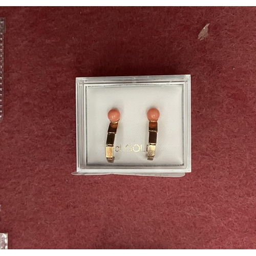 628 - Pair of 9ct gold earrings