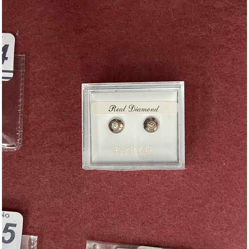 629 - Pair of 9ct gold diamond earrings